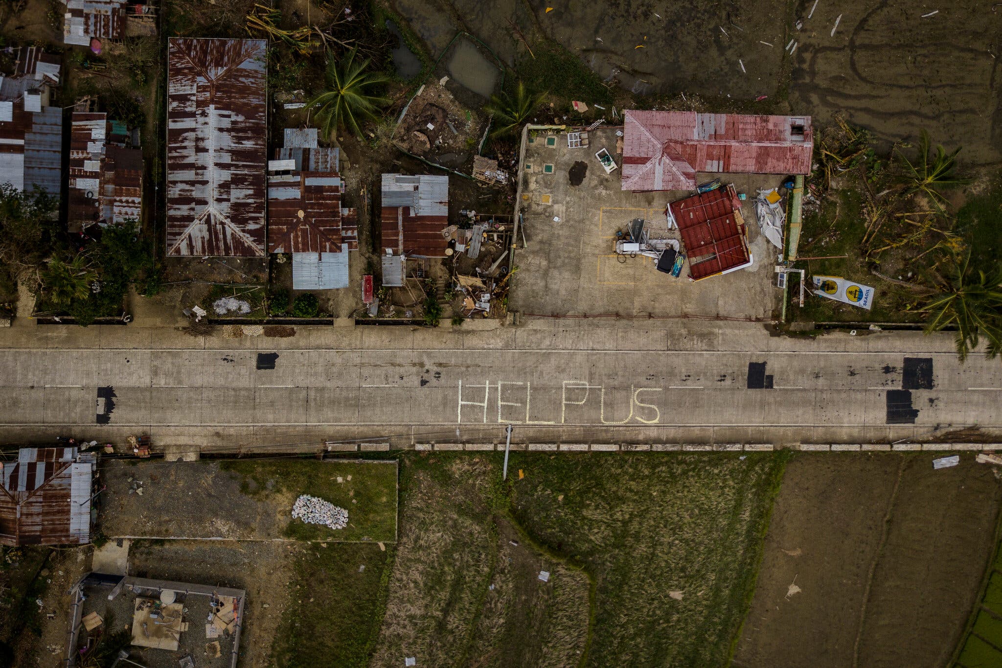 ‘Help Us’: After Typhoon Rai, Miles of Destruction and the Smell of Death